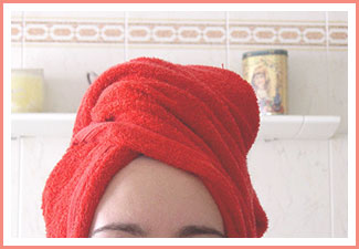 drying-hair-with-red-towel